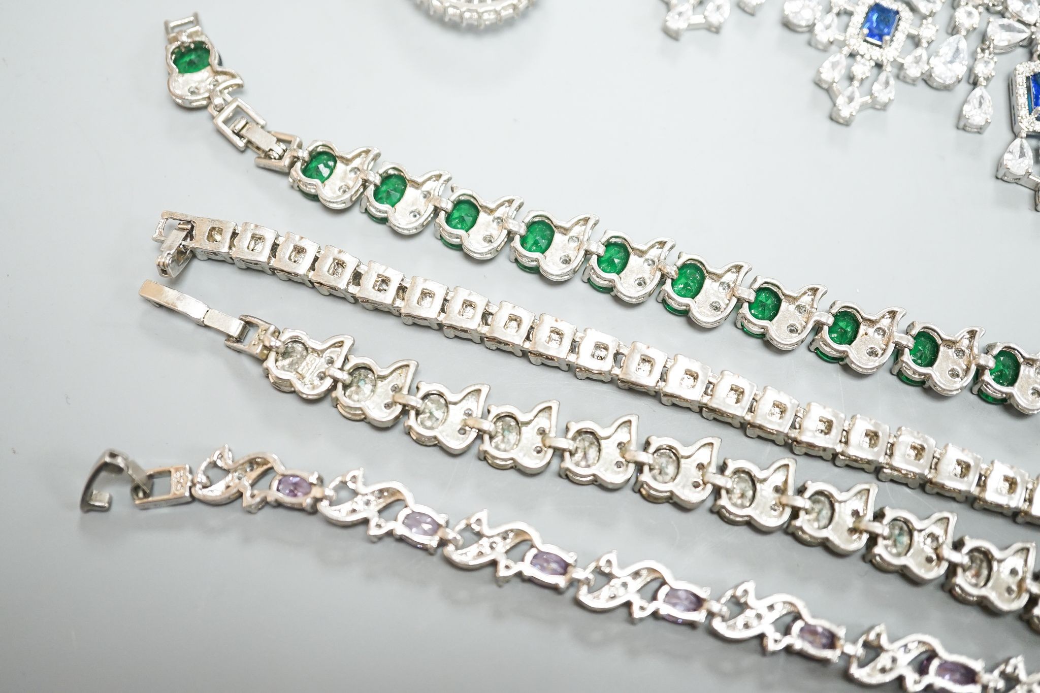A small group of 925 or white metal and paste set jewellery, including necklaces, bracelets and earrings.